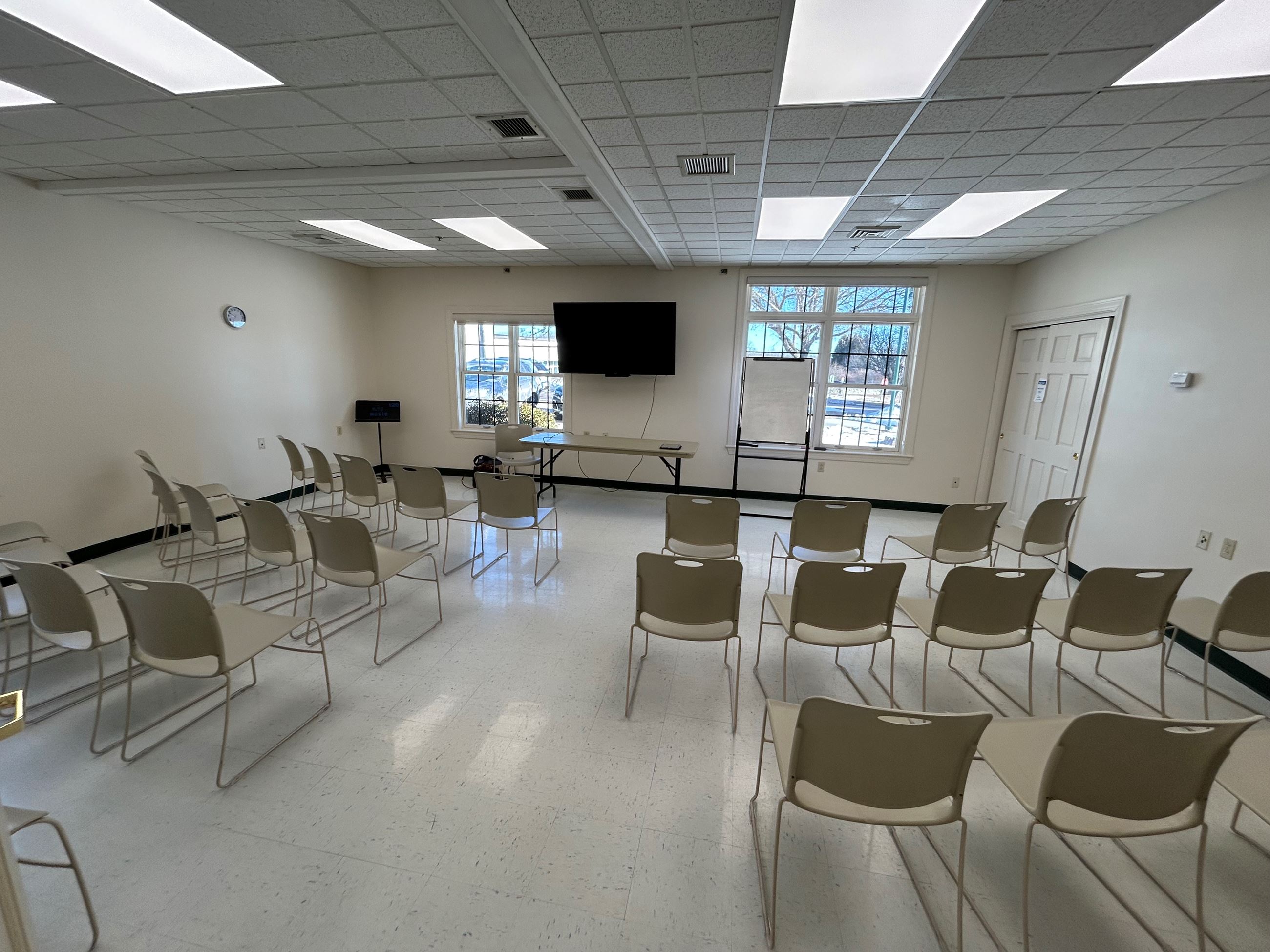 The Back Room is a classroom seating up to 40 with a wall mounted television.
