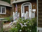 The front of Robert Beverly Hale Library with flowers in front of it